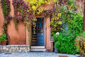 Blue door of a stucco house in Berkeley