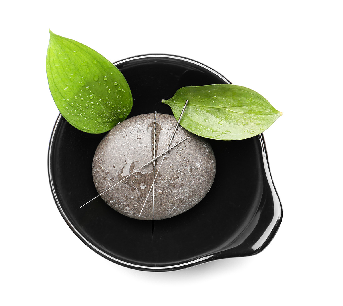 Bowl with acupuncture needles and spa stone on white background