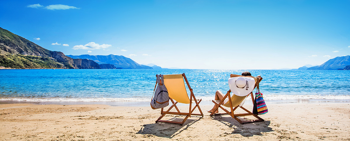Woman enjoying sunbathing at beach.