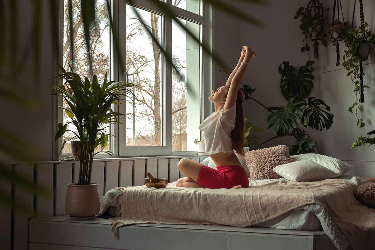 Young woman practicing breathing yoga. Relaxation and meditation.