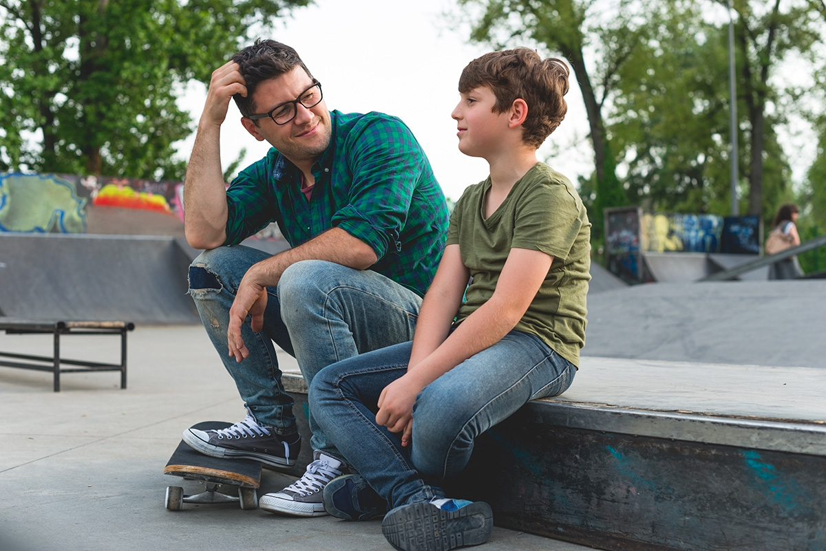 A dad spending quality day with his teen son.