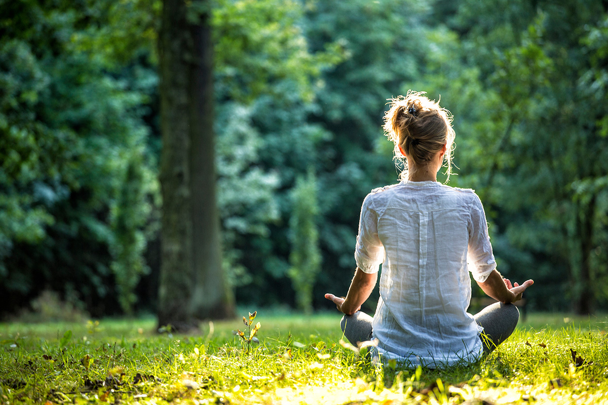 Woman meditating and practicing yoga
