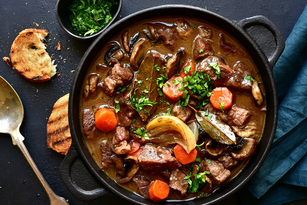 Beef bourguignon - meat stew with vegetables and mushrooms