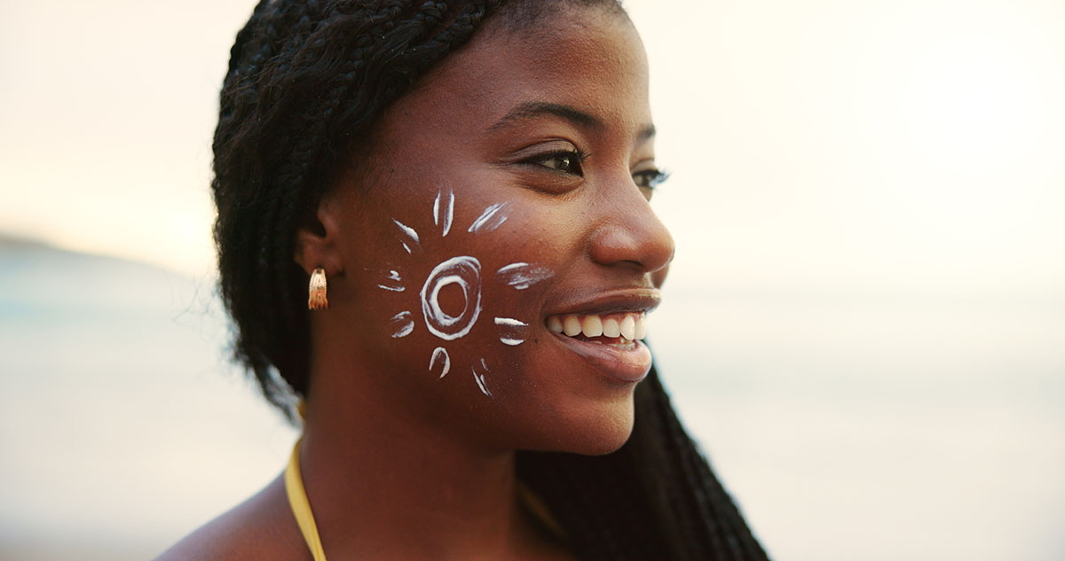 Woman with sunscreen for skincare, uv protection or beauty at sunset.